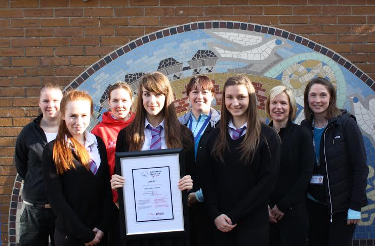 PHYSICAL EDUCATION: Staff and pupils from Lewis Girls' School  with the ActiveMark Cymru Award