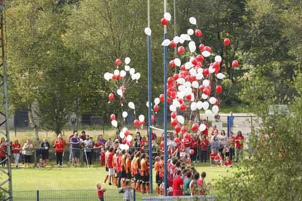 YOU'L' NEVER WALK ALONE: The players released balloons representing Jake Sweeney's beloved Liverpool FC