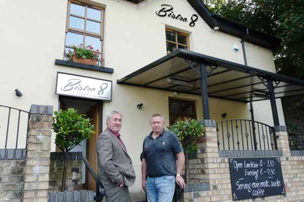 BACK OF THE NET: Former County apprentice Richard Hamer (right) and Haydn Thomas, of Hutchings and Thomas Chartered Surveyors, outside Bistro 8 in Blackwood