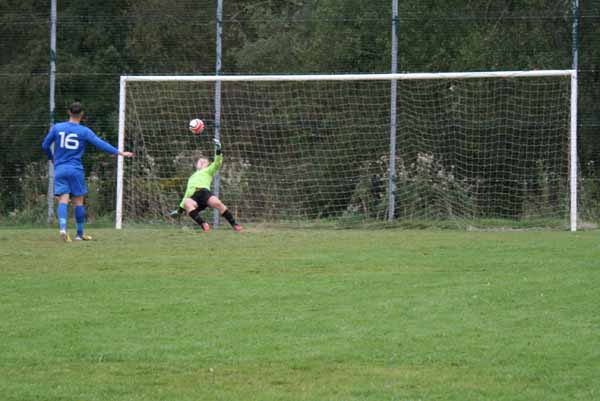SAVED: Matthew Farr saves the vital penalty 