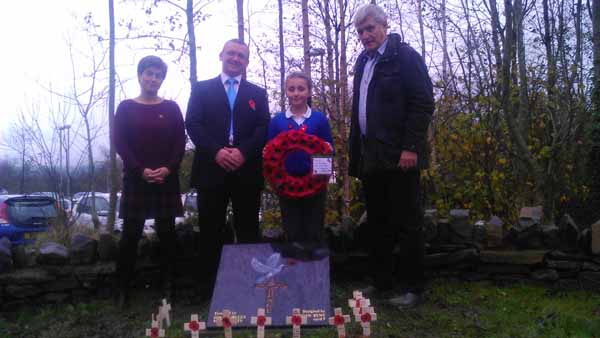 Teacher Bethan Jones, headteacher Paul Samuel, Megan Bynt and John Styles, of South Wales Monuments