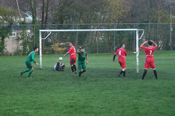 Dan Falconer celebrates opening the scoring against Hopkinstown