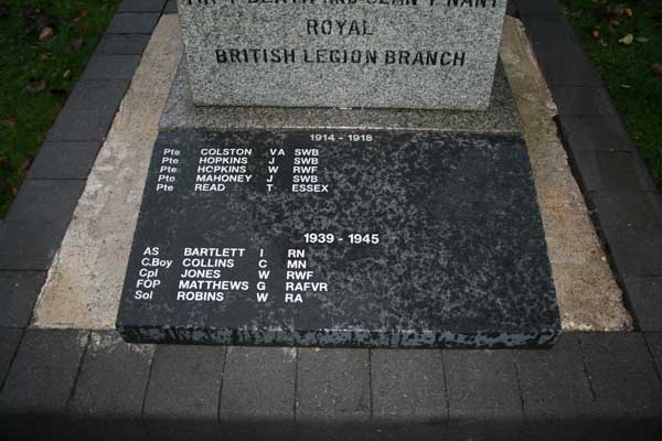  The plaque, which is inscribed with the names of local Tir-y-Berth men who lost their lives in the line of duty during the First and Second World Wars.
