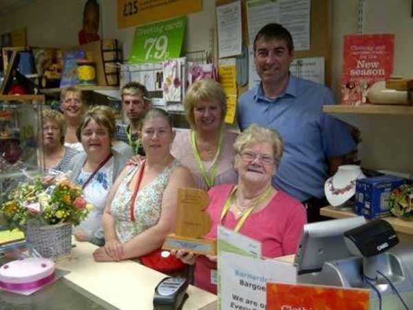 CHARITY SERVICE: Valerie with other Barnardo's shop workers in Bargoed