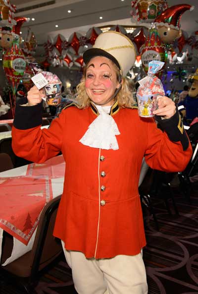 Christmas party host Laura Savory, Great Ormond Street Hospital Children’s Charity, with some of the BBB donations