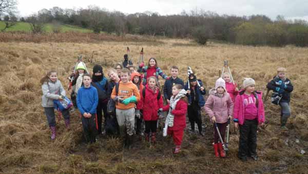 INVADERS MUST DIE: Schoolchildren removed unwanted scrub from the grassland