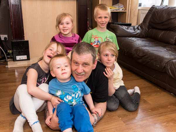 HAPPY HOME: Colin with some of his 11 children