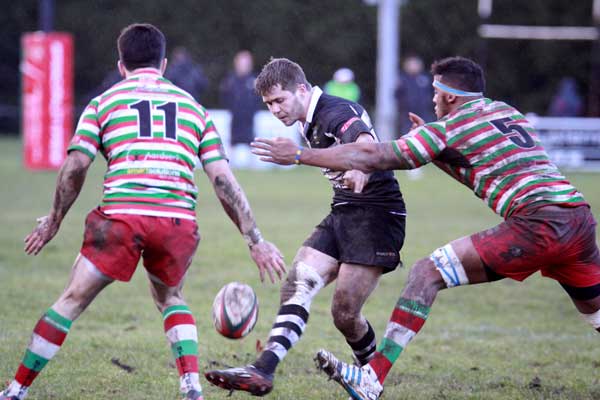 Bedwas' Tom Rowlands chips through against Ebbw Vale