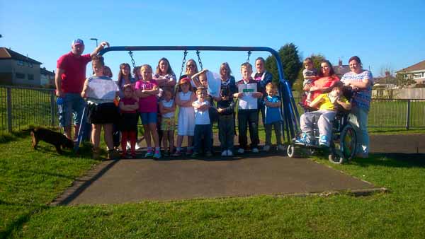 ANGRY: Residents and children with drawings of their dream park 