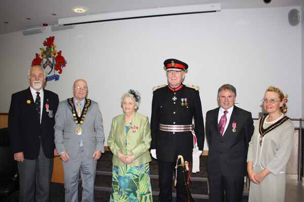 HONOURED: From left to right John Geraint Evans, Mayor Cllr Carter, Rita Evans,  Lord-Lieutenant Simon Boyle, David Curtis, Mayors Consort Valentina Carter