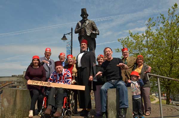 JUST LIKE THAT: Tommy Cooper Society members with cast members of teh Tommy Cooper Show Daniel Taylor (centre) and Gareth Jones (front right)