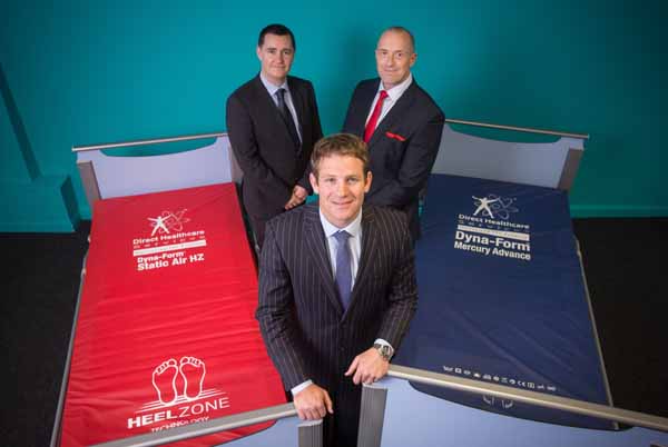 GROWTH: Stewart McAllister (centre), with Direct Healthcare Services’ Gerry Boyle (left) and Graham Ewart