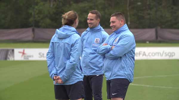 COACH: David Gough (right) shares a joke on the training pitch