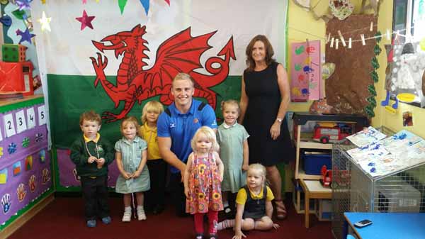 THANKS: Luc Jones and Maria Chapman celebrate with the children
