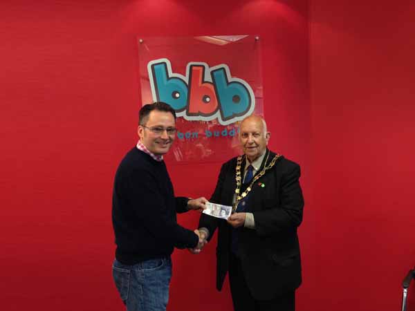 Justin Thomas, Managing Director of Bon Bon Buddies, with Mayor Leon Gardiner