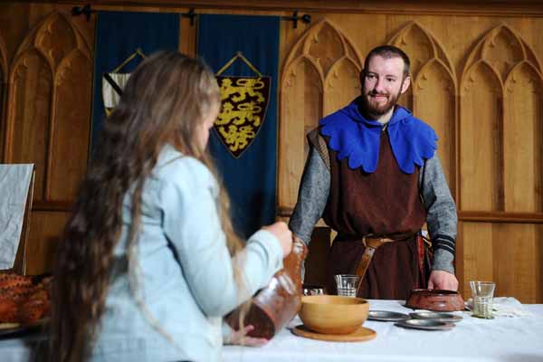 PLAYING SERF: Children learnt about medieval feast preparations 