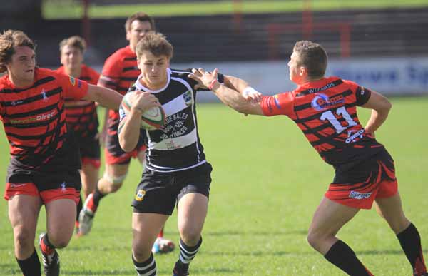 SOLID: Connor Edwards tries to break through the defence