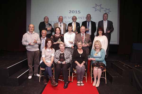 HONOURED: The volunteers with their awards