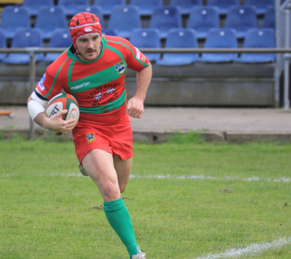 SPEEDSTAR: Wing Rory Budina on his way to one of two tries for Bedwas
