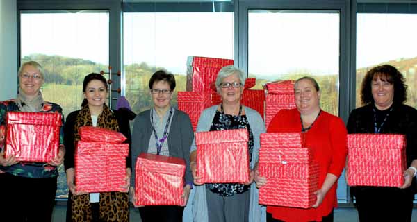 CHRISTMAS SPIRIT: Council staff help out during last year’s Operation Santa