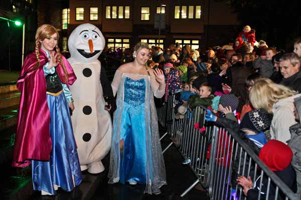 FROZEN: Elsa, Anna and Olaf entertain children at the Caerphilly Christmas lights switch-on. Picture by Carl Jones