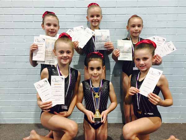 The gold-winning Level 5 team and Amy Oliver