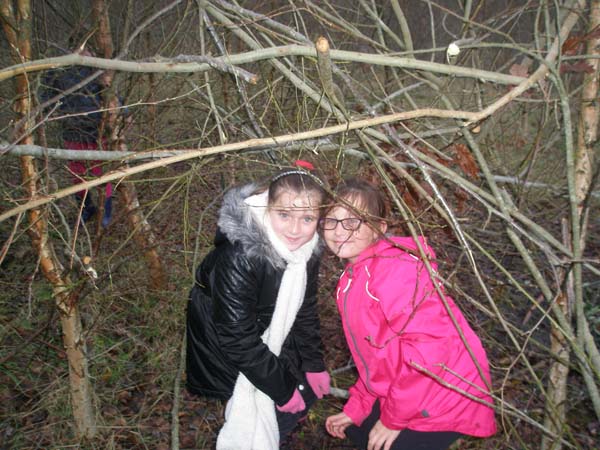 Megan Hardacre and Morgan Gwyther help with some tree planting