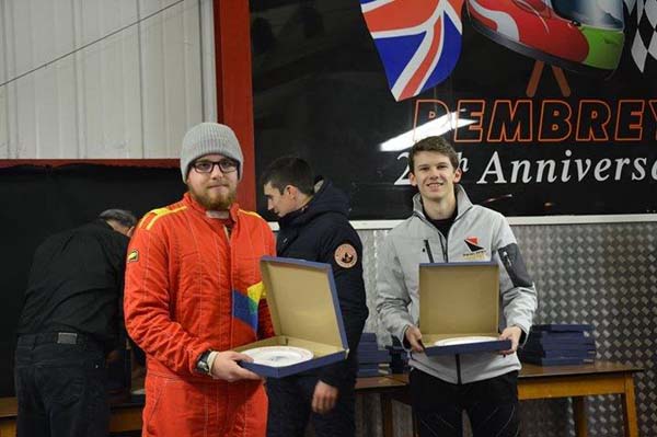 Aaron Jones (right) and co-driver Owen Evans (orange race suit)