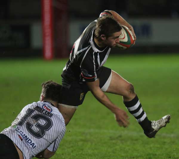 Bedwas’ Iwan Phillips attempts to shake off his tackler