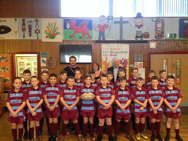 SUITED AND BOOTED: Pupils from Pla-y-Felin Primary School show off their kit