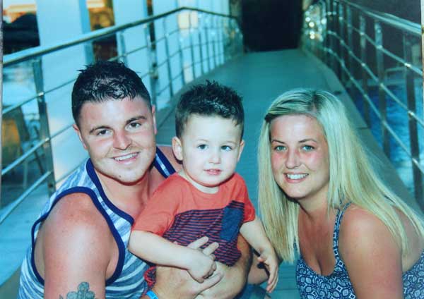 Ross Mason-Price, with his son Kaden, who was diagnosed with autism in January, and partner Danielle Meredith
