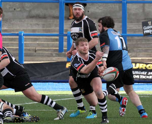 Bedwas scrum-half Tom Rowlands spreads the play during his side's 26-24 loss to Cardiff