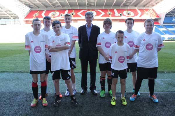 Steve Cranston, Head of Community Investment for United Welsh, with the Caerphilly team at the Cardiff City Stadium 