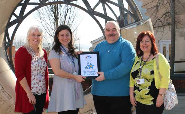 Blackwood Miners’ Institute Deputy Theatre Manager Marina Newth (centre left) and Dementia Friendly Community Coordinator Ian Thomas (centre right) with Michelle James (left) and Jan Bloor (right) from the Alzheimer’s Society
