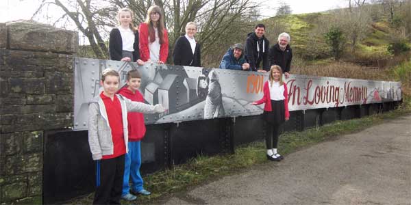 MEMORY: Nant y Parc pupils with the mural in Senghenydd