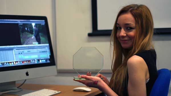 SCENE: Rebecca Feazelle with her Zoom Cymru award