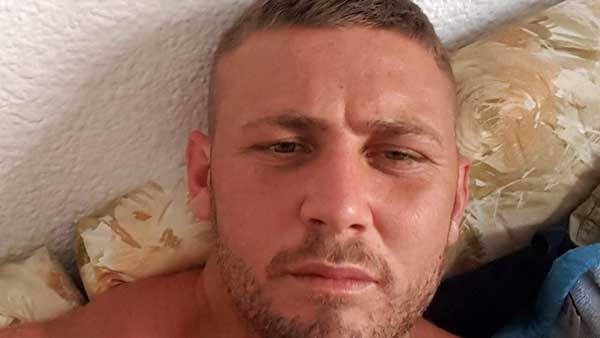 ATTACKED: James Hallett, 25, remains in hospital abroad