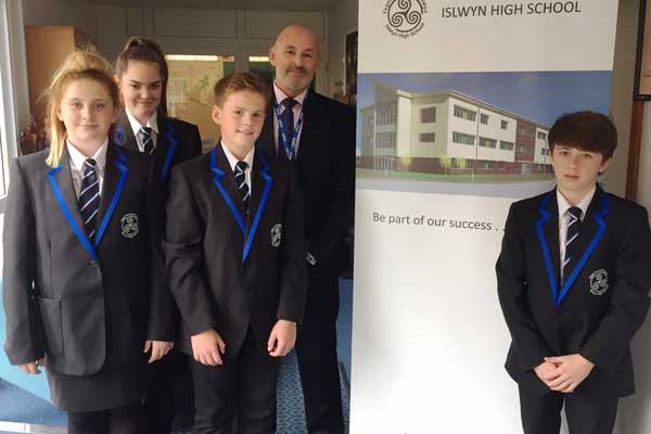 Headteacher Tim Williams with Islwyn High School pupils in their new school uniform