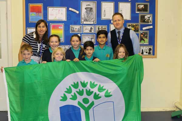Teacher Miss Banks and headteacher Paul Warren with Rhydri Primary’s eco-committee