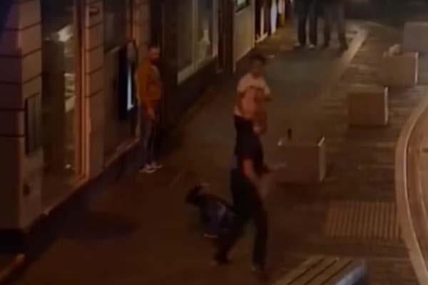 Police are looking for the man wearing black after an assault outside a nightclub in Bargoed
