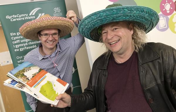 Alan Scott, right, is heading to Mexico after gaining employment with the help of Careers Wales advisor Phil Roberts