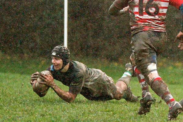 HARD-FOUGHT: Replacement winger Dewi Jones scores Caerphilly's only try