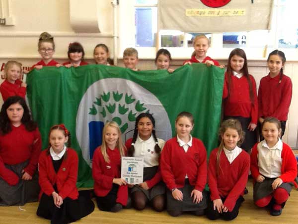 ENVIRONMENTAL: Pupils of Cwmfelinfach Primary School with their latest eco green flag