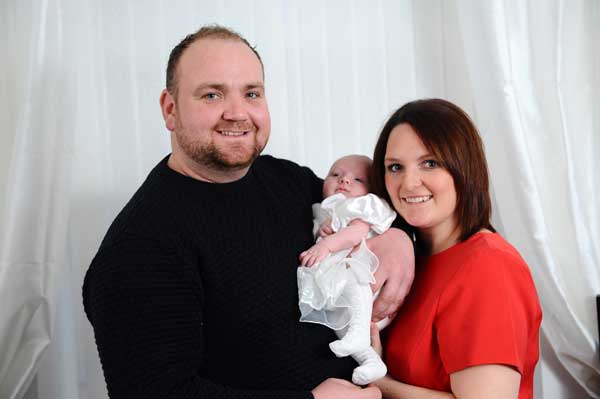 MIRACLE: Annmarie Bowen with baby Pollyanna and boyfriend Lee Williams.  Photo by WalesNewsService