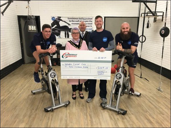 IN A SPIN: Mayor of Caerphilly County Borough, Cllr Dianne Price, and Mayor’s Consort, Ernie Carroll, with Chris Eatwell, Andrew Morgan and Cai Barnaby of Caerphilly Leisure Centre
