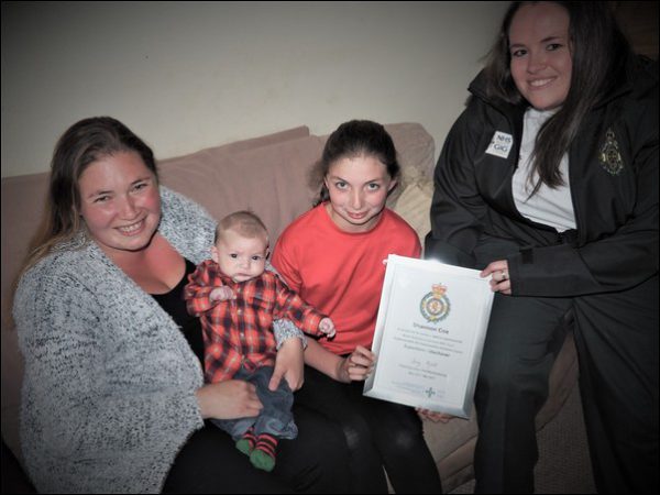 BRAVE: (L-R) Sarah Cox, son Riley, daughter Shannon and Welsh Ambulance Service call handler Danielle Burrows.