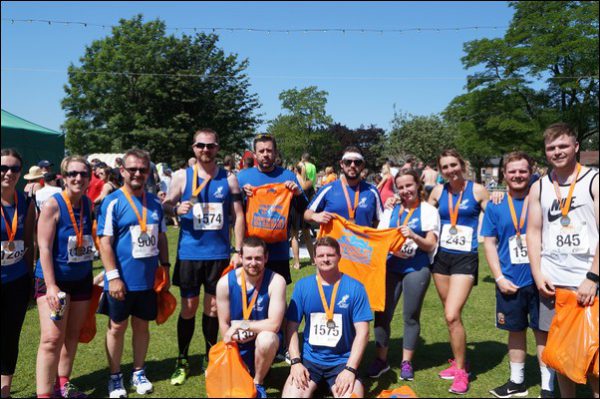 Members of Ystrad Runners following the Bryn Meadows Caerphilly 10k