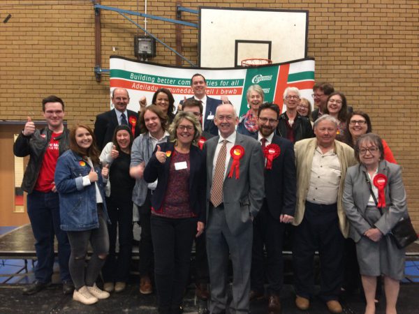 Wayne David and Labour activists celebrate their win in Caerphilly