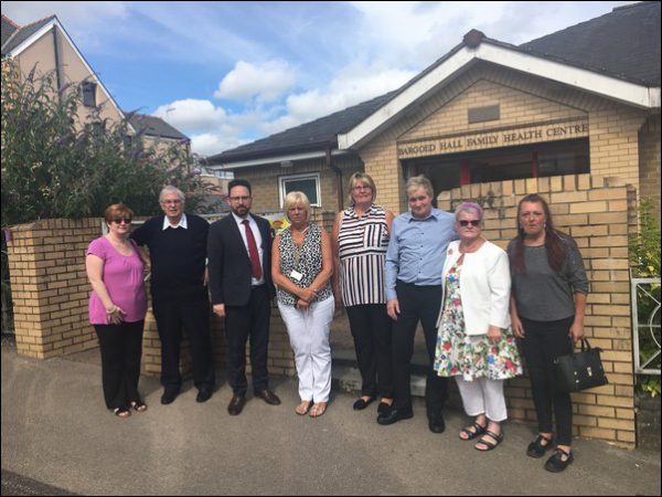 CLOSURE: Hefin David, third from left, with community representatives from Bargoed