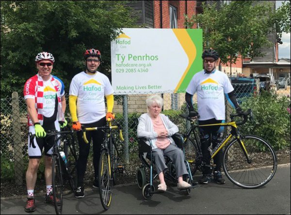 ON YER’ BIKE: Terry Burston, right, is raising money for T? Penrhos care home after his mother was diagnosed with dementia